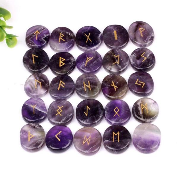 Amethyst is the gemstone of Healing & Love. Our Dark Amethyst Gemstone Runes are beautifully carved 25 piece sets with engraved lettering and hand painted in gold.